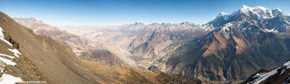Descending from Damphus Pass. View of Annapurna, Nilgiri, Tilicho Peak and Upper Mustang
