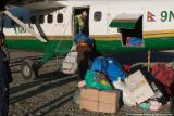 Unloading luggage at Juphal airfield