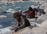 Local children washing their clothes
