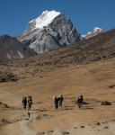 Porters heading towards Dingboche (with Lobuche in the background)