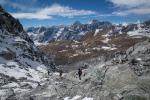 Three trekkers descending the Cho La towards Tagnak