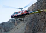 A helicopter whisking off one of our group members to Kathmandu