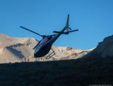 A helicopter whisking off one of our group members to Kathmandu